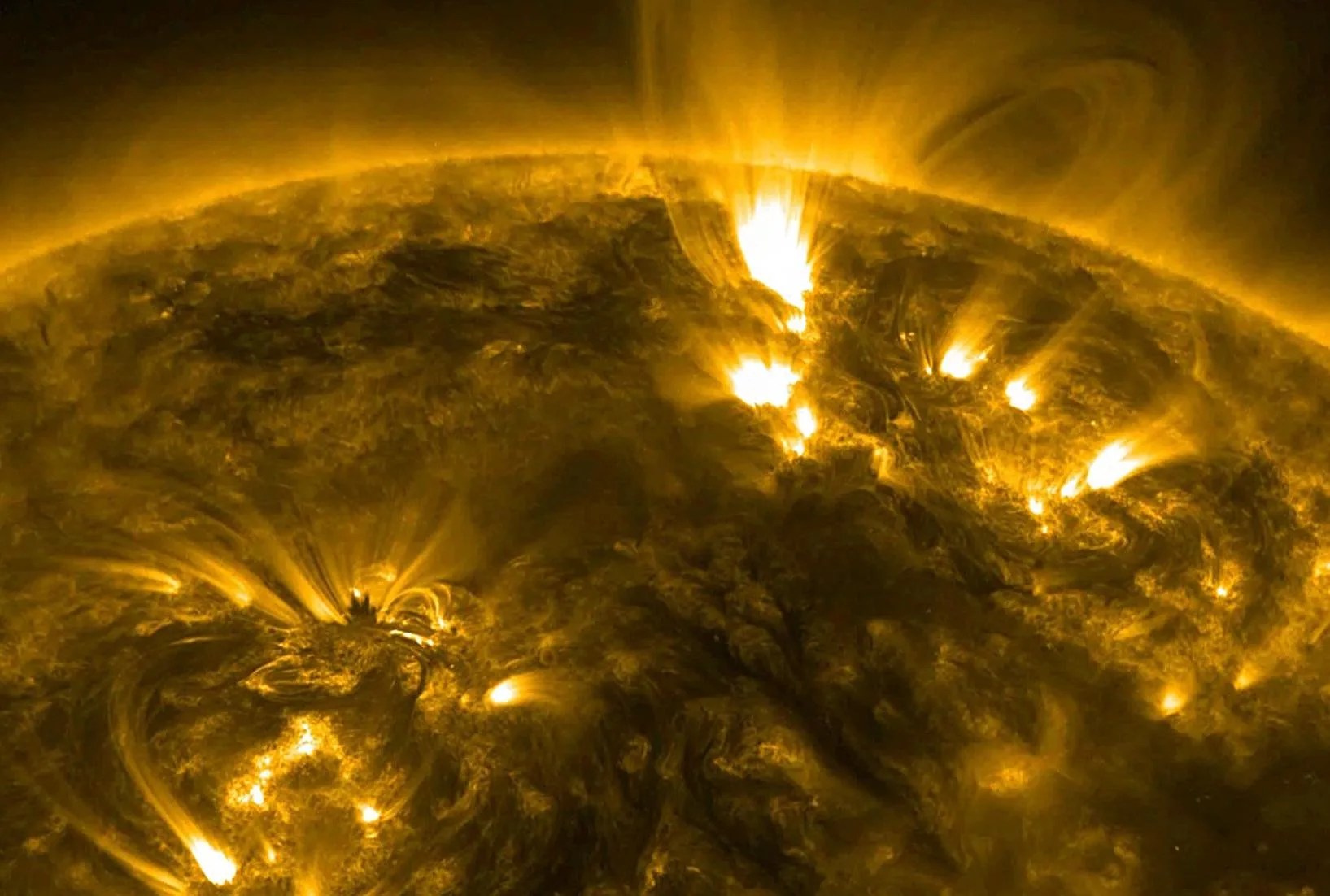 swirling plumes of gas above the surface of the Sun