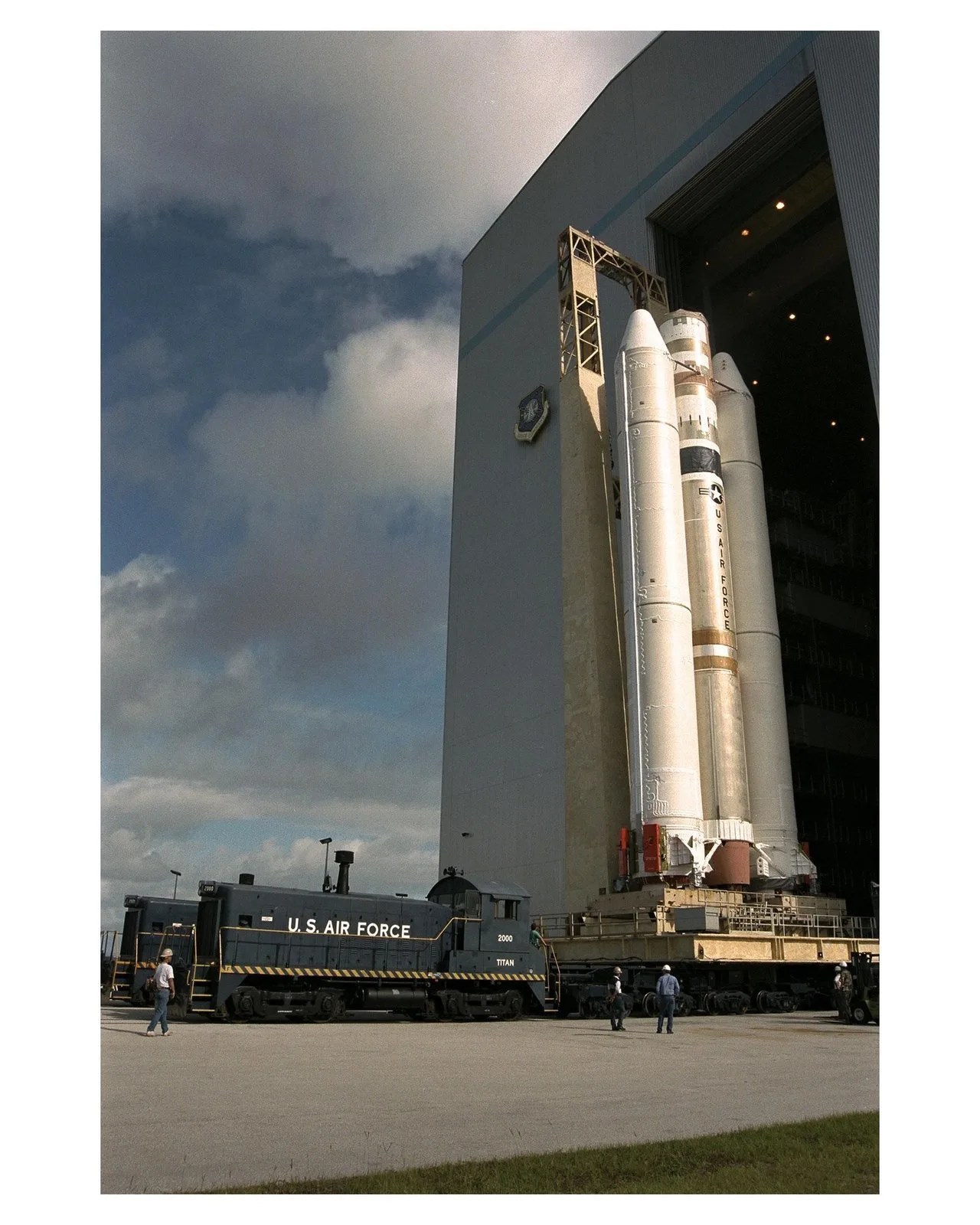 Color image of rocket at launch pad.