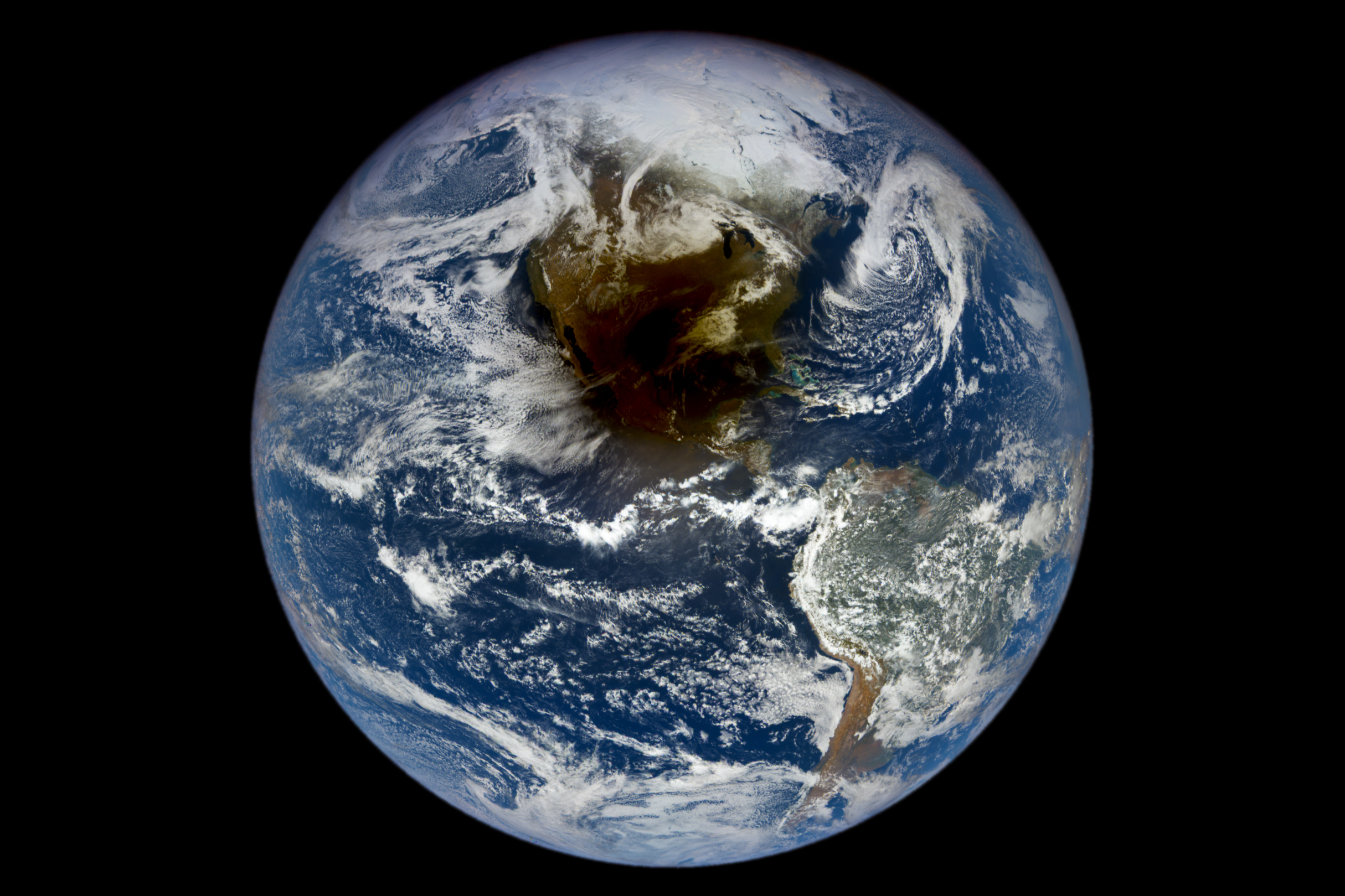 A satellite image of North America shows a darkened spot centered on the South Central United States and Mexico with a gradually increasing gradient of visibility as you move outward. The dim spot that strongly limits the visibility of the land spans from West Coast of Mexico to the Florida panhandle