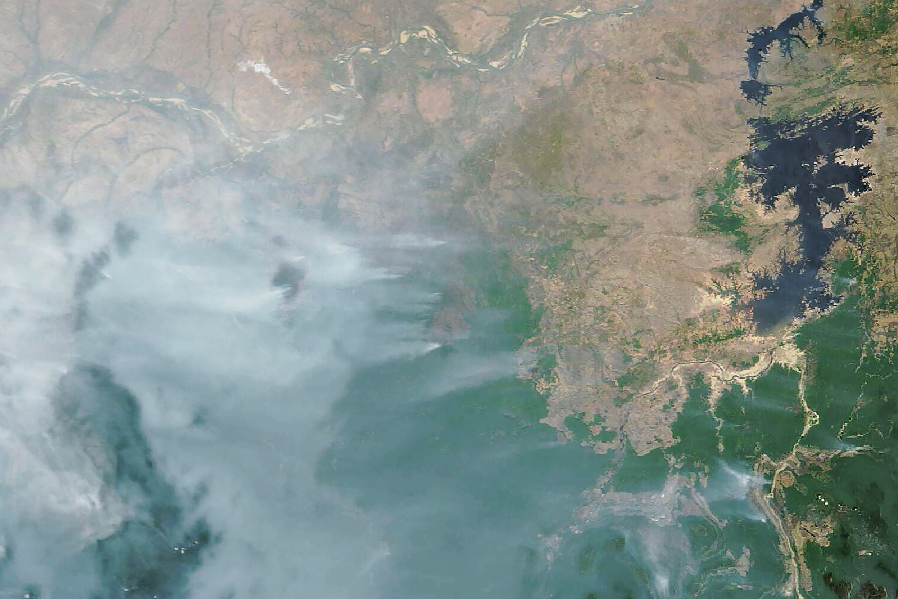 This image, acquired by MODIS on NASA’s Terra satellite, shows several large, smoky fires burning south of the Orinoco River on March 26, 2024. Brown areas in the northern part of the image are part of the Llanos, a mostly treeless savanna covered with seasonally flooded grasslands and cattle pastures. The green areas in the southern part of the image are rainforests that span the fringes of the Guiana Highlands, a plateau that covers the southern half of Venezuela.