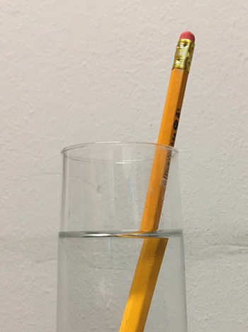 A pencil in a glass of water