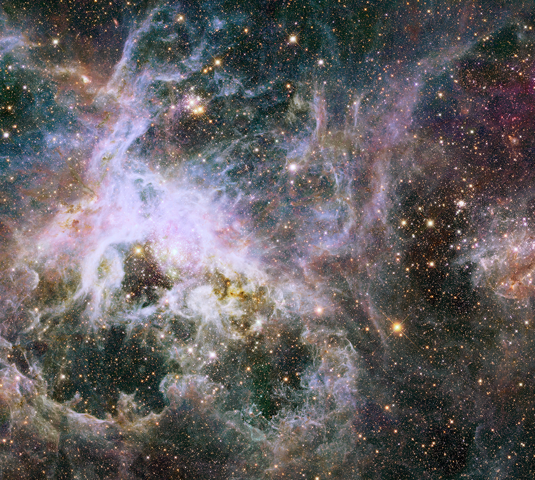 Intertwined wisps of light purple clouds of dust and gas envelope the entire image. Countless orange stars pepper the image.