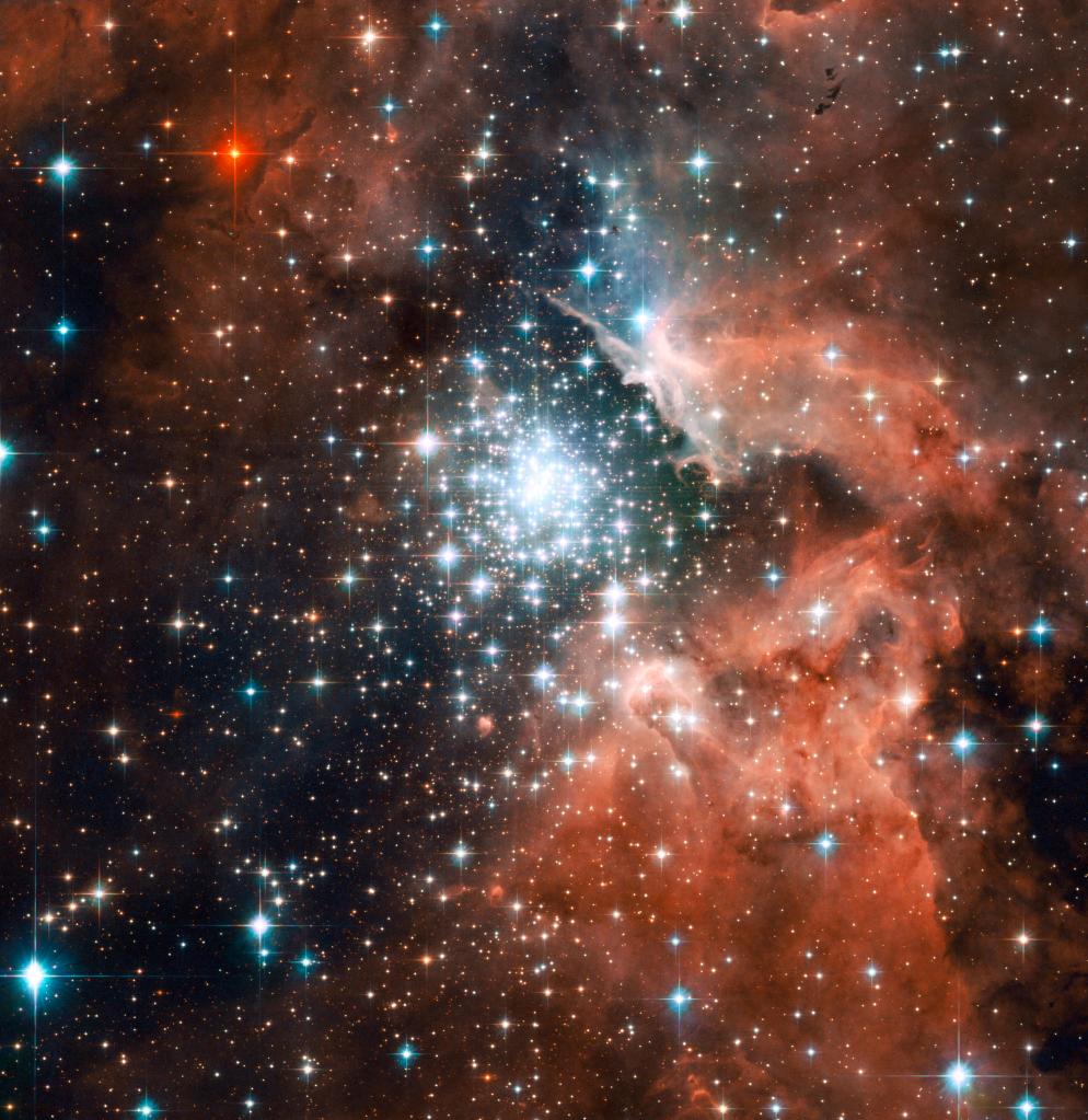 Large cluster of stars in the center of the image, surrounded by red dust and gas.