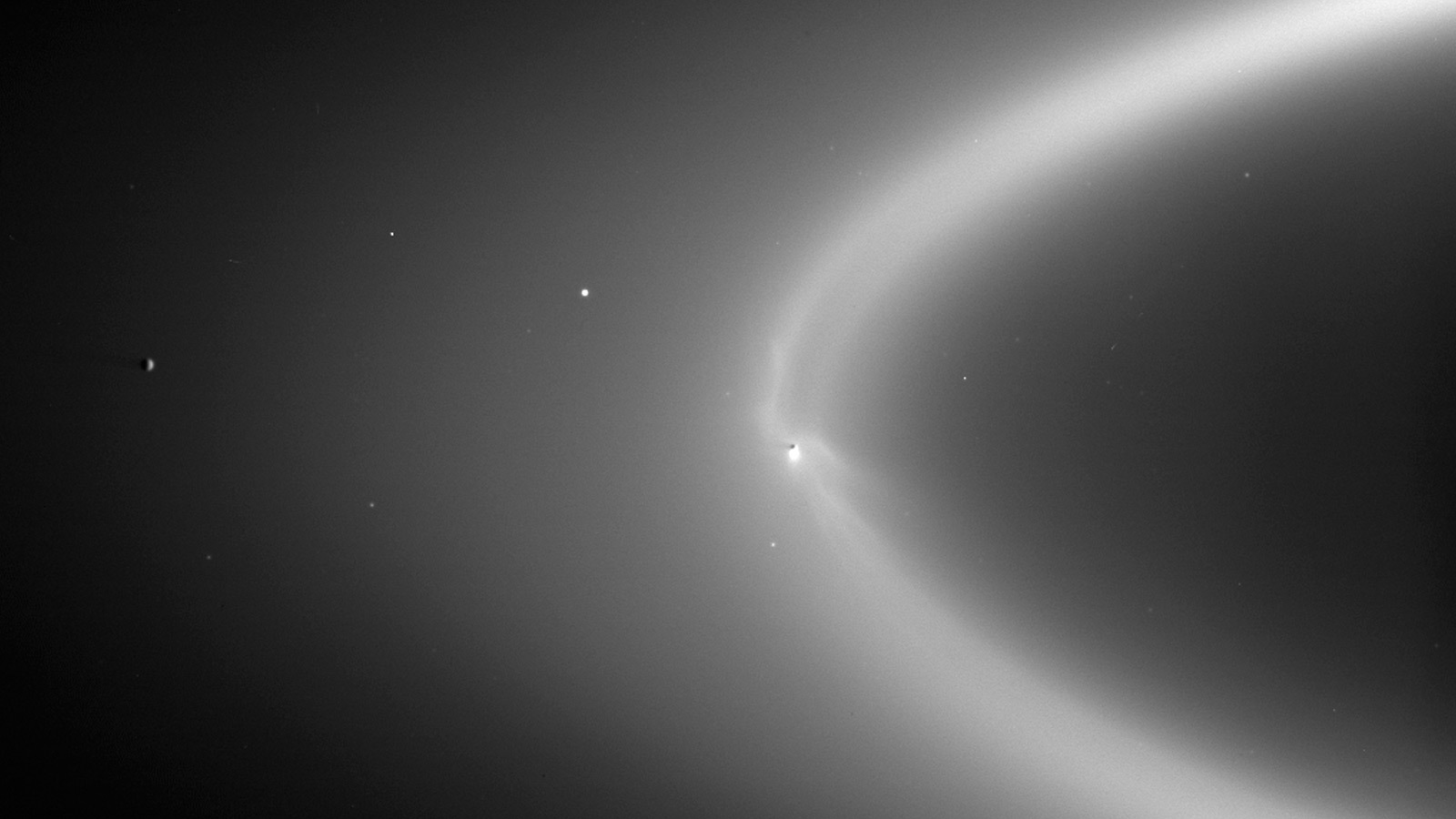 Black and white image of dusty rings at Saturn.