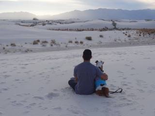 Brandon with his dog at the beach.