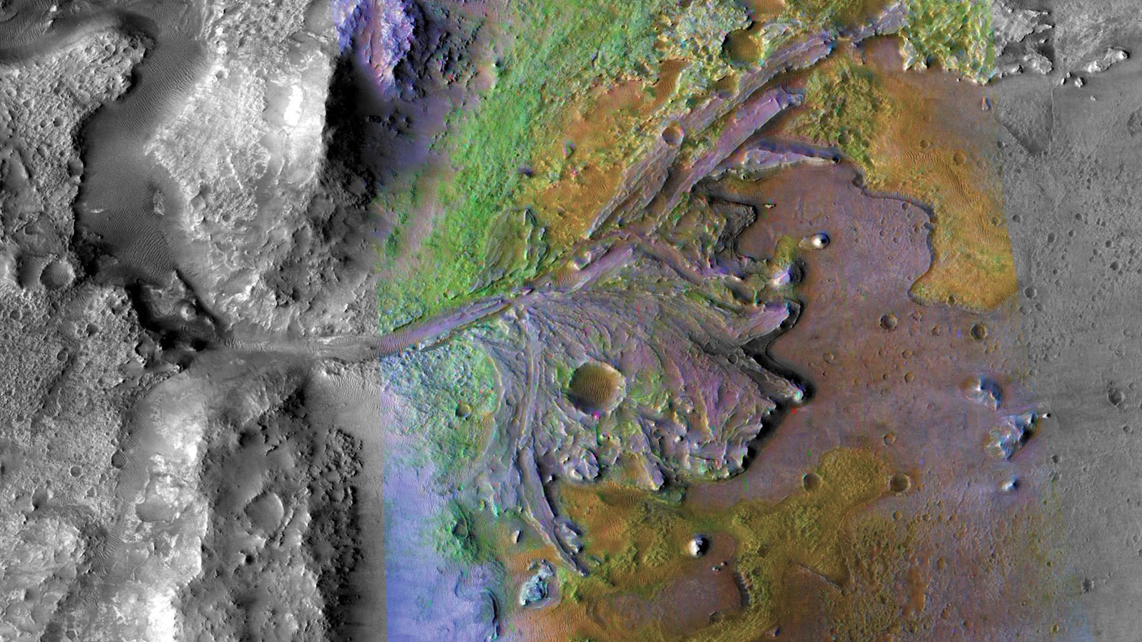 在这张火星杰泽罗陨石坑的照片中，水切割的通道和输送的沉积物在湖盆内形成了扇形和三角洲。