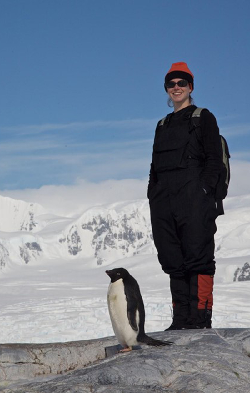 Heather with an Adélie penguin