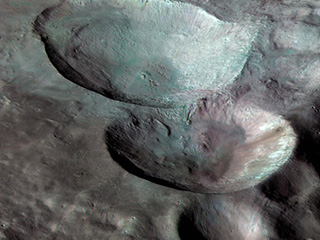 near-true color image of the remarkable snowman feature on asteroid Vesta's surface