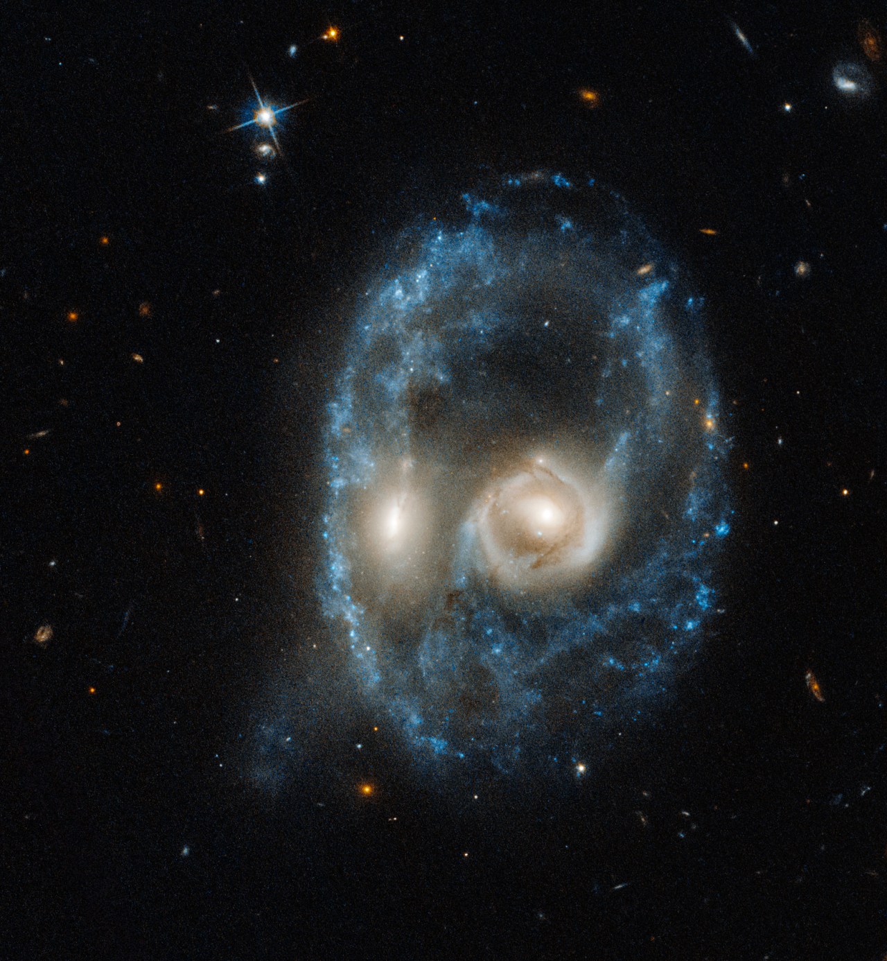 Hubble Views Arp-Madore 2026-424