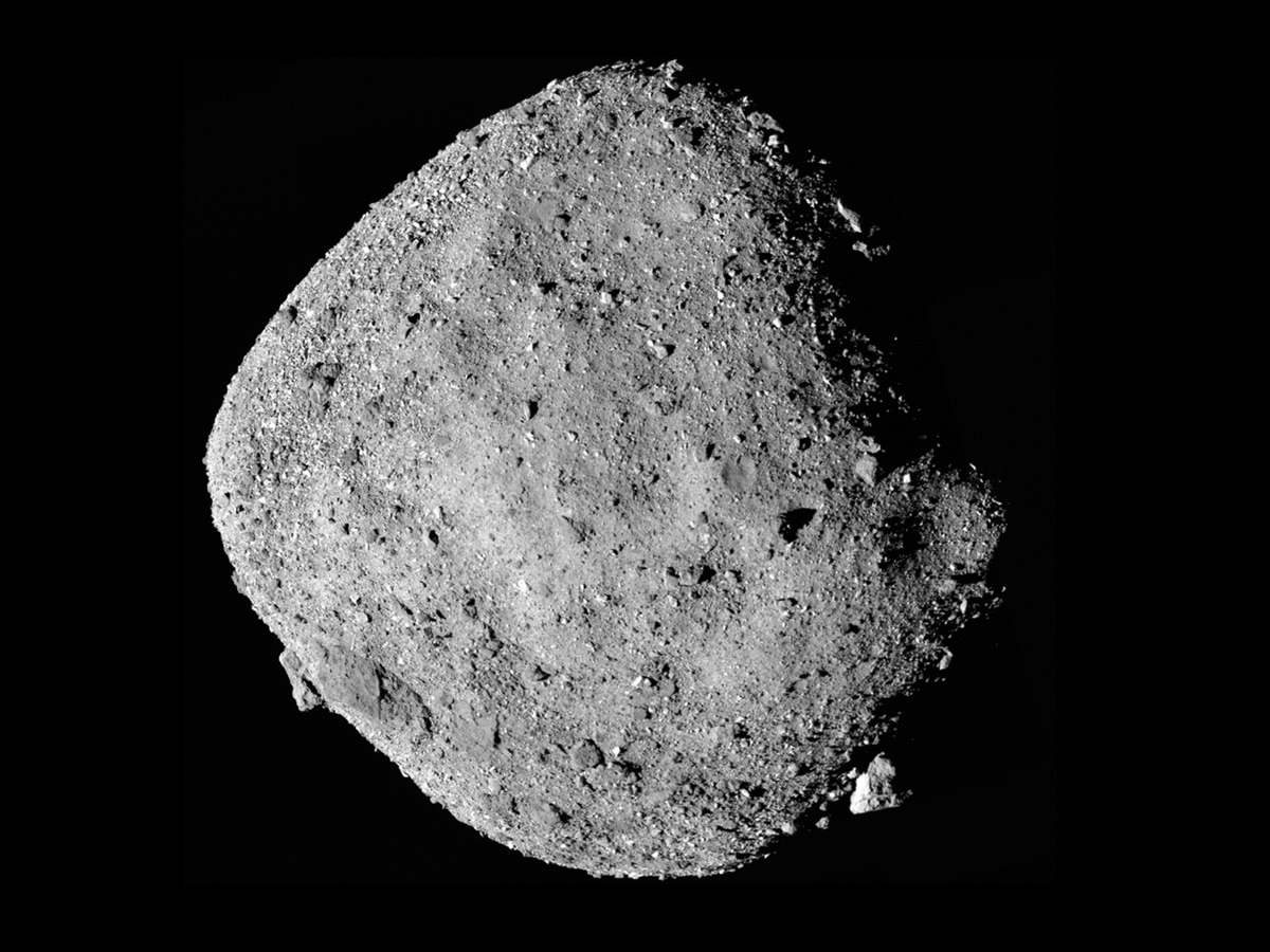 Gray-colored asteroid Bennu is shaped like a spinning top.