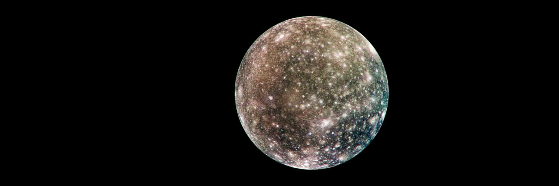 Bright scars on a darker surface testify to a long history of impacts on Jupiter's moon Callisto in this image of Callisto from NASA's Galileo spacecraft.
