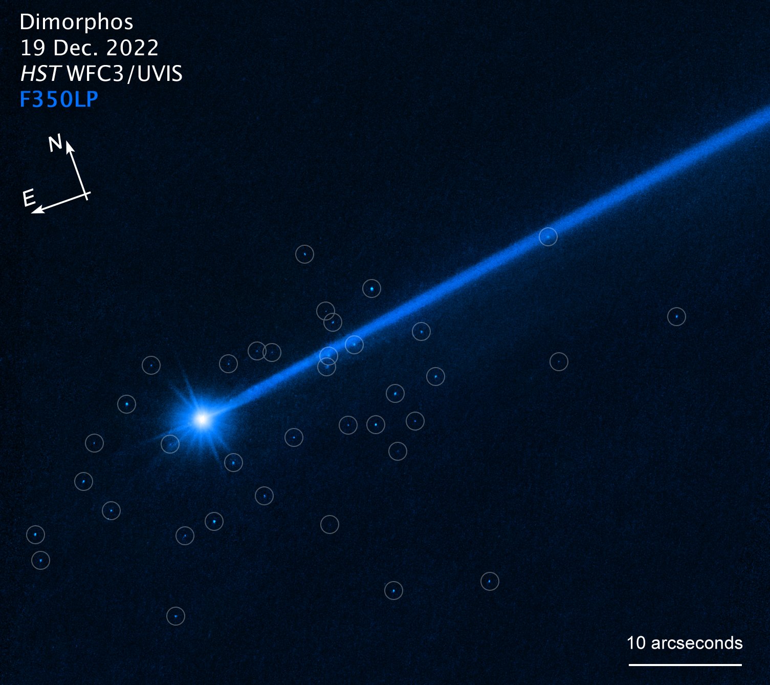 Fragmentos del asteroide Dimorphos captados por el telescopio Hubble, que serían la primera lluvia de meteoritos causada por humanos