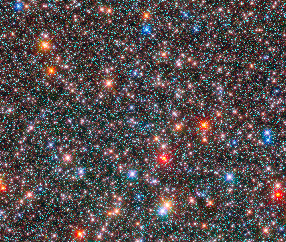 A sea of stars in colors of white, blue, yellow, orange, and red.