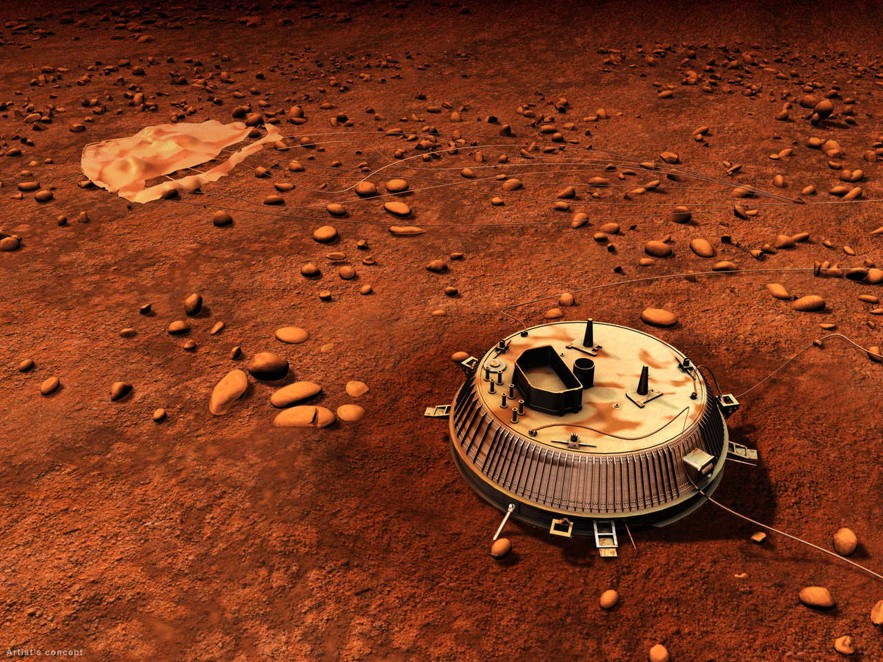 Lying on terrain of dark reddish-orange soil amid scattered rocks, a craft resembling the lid of a disposable coffee cup, but metal and nine feet wide, rests in the foreground. In the background, at upper left, lies its deflated parachute, and both are dusted in the native orange soil.