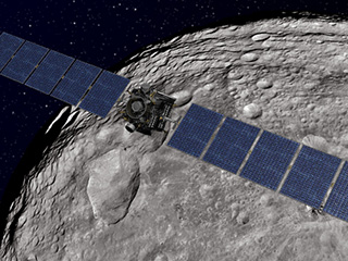 Artist's concept of the Dawn spacecraft at asteroid Vesta