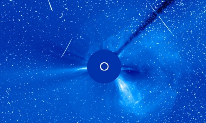 Solar coronagraph with many white spots caused by high-energy protons.