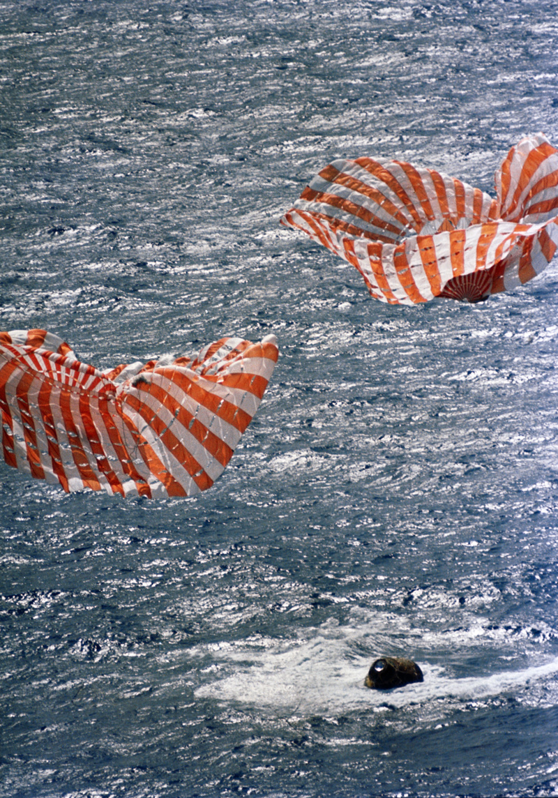 Apollo 14 command module, with parachutes, lands in the ocean