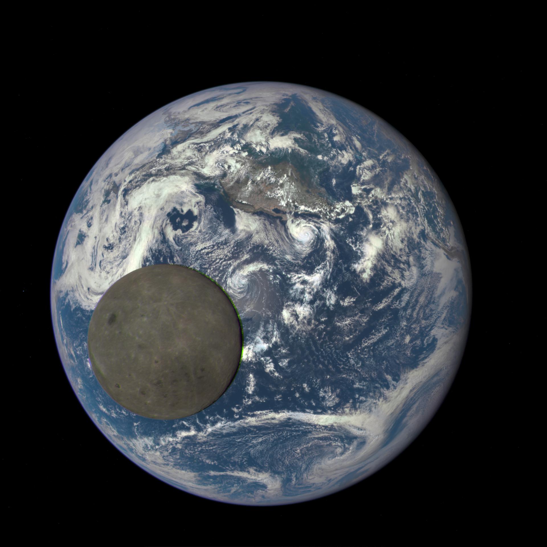 Dark grey Moon passing in front of Earth. The Moon's diameter appears to be about 1/3 of Earth's from this point of view. 