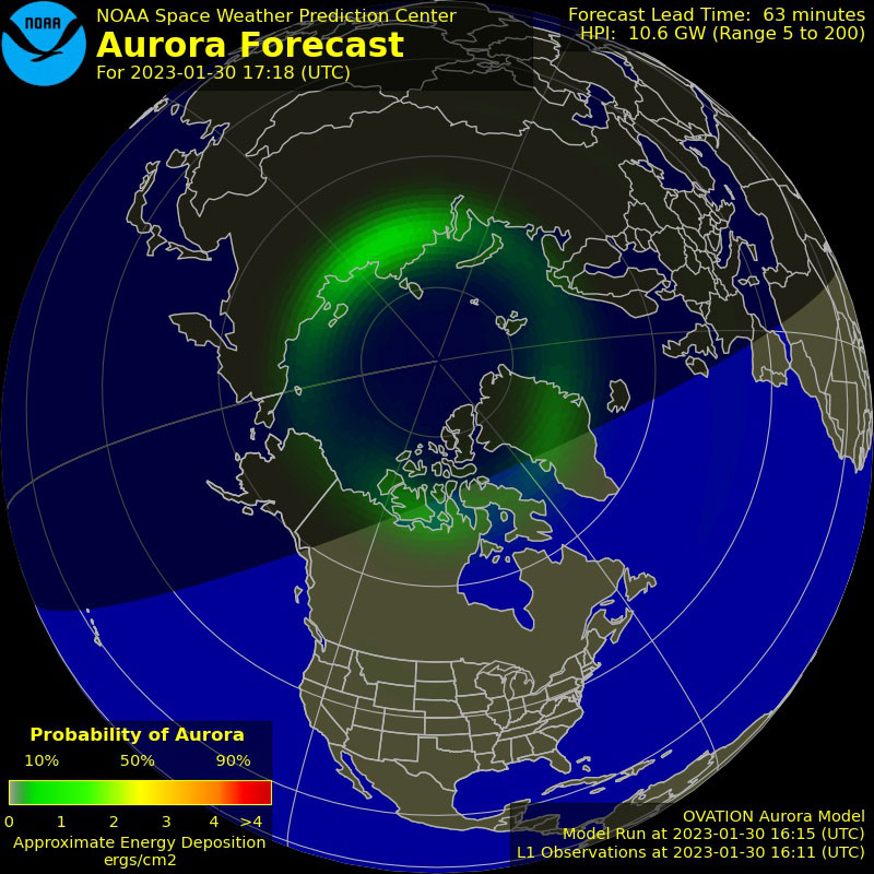 View of blue and green Earth looking down at the North Pole surrounded by light green lights representing the aurora.  "NOAA Space Weather Prediction Center, Aurora Forecast" spelled out in upper left hand corner and "Probability of Aurora" green to yellow to red scale on bottom left