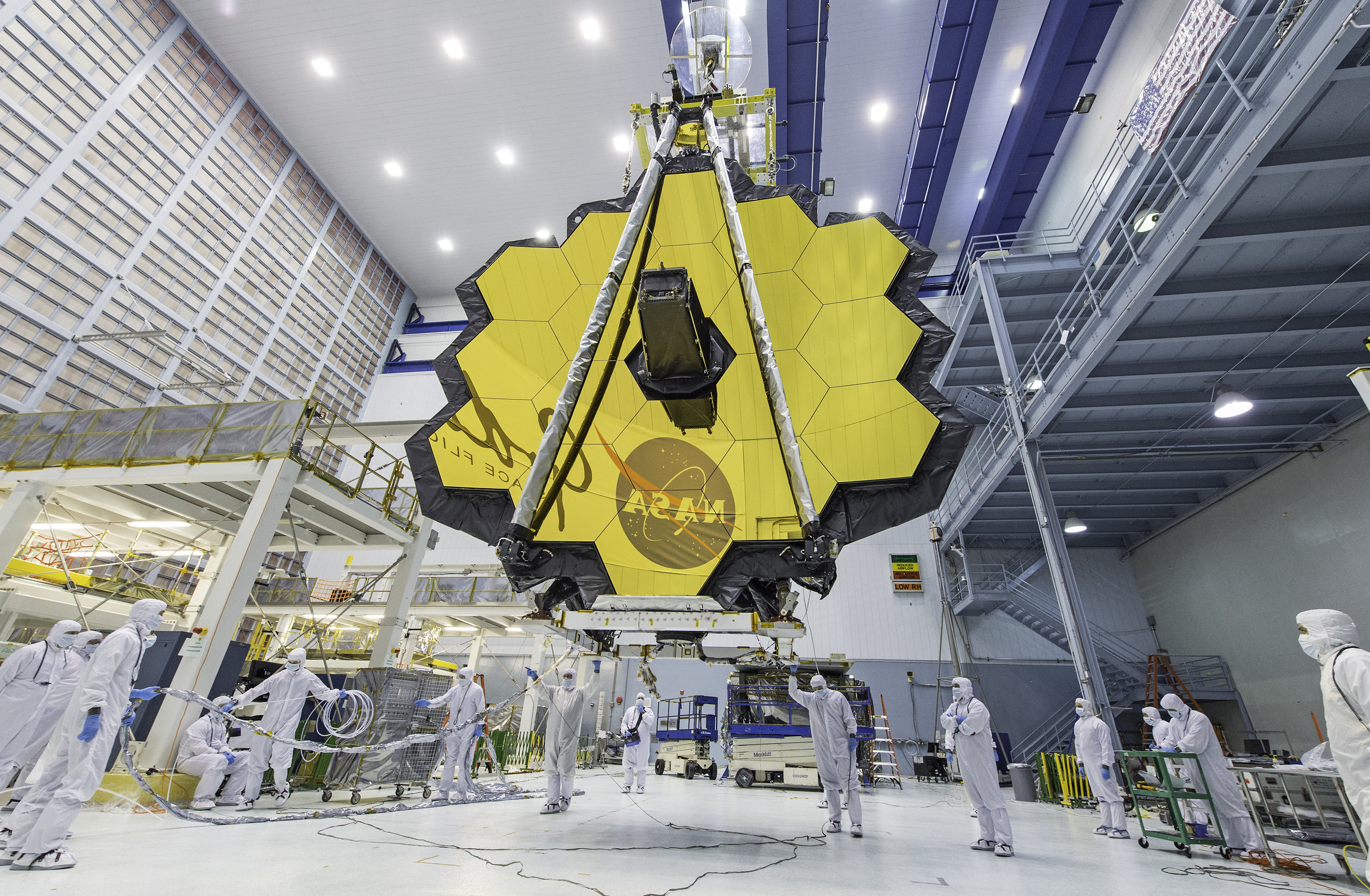 NASA technicians lifted the telescope using a crane and moved it inside a clean room at NASA’s Goddard Space Flight Center in Greenbelt, Maryland.