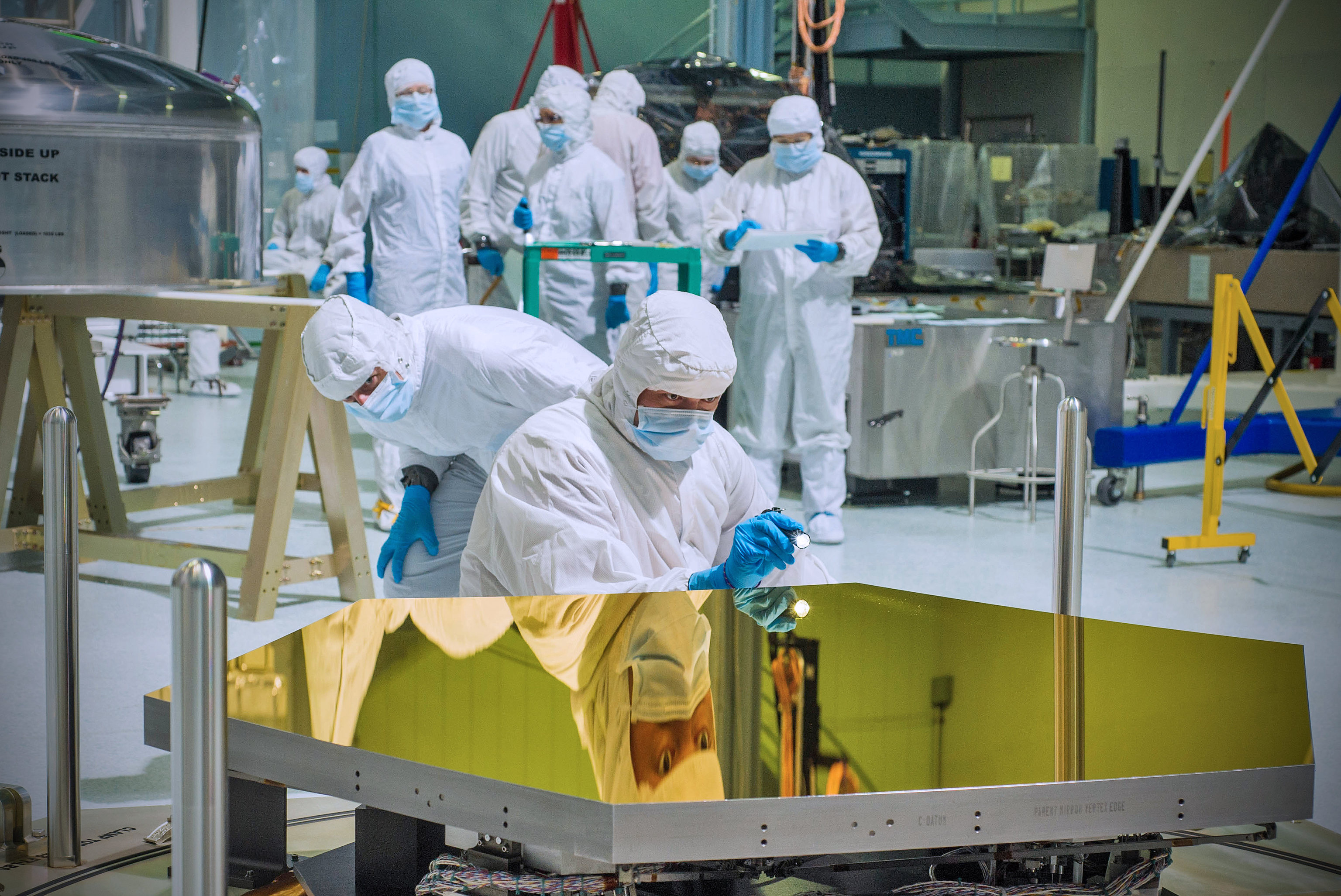 Technicians and scientists are part of the Flight Mirror Segment Inspection