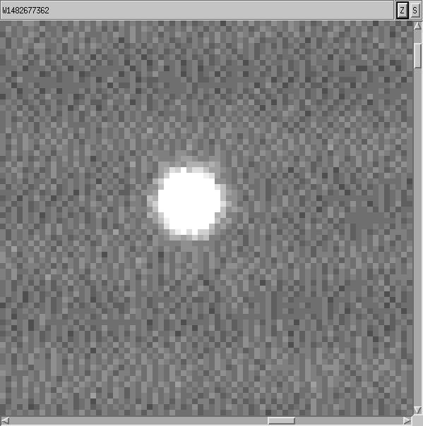 The Huygens Probe appears as a fuzzy white dot in this image.
