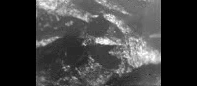 black and white image of titan's surface