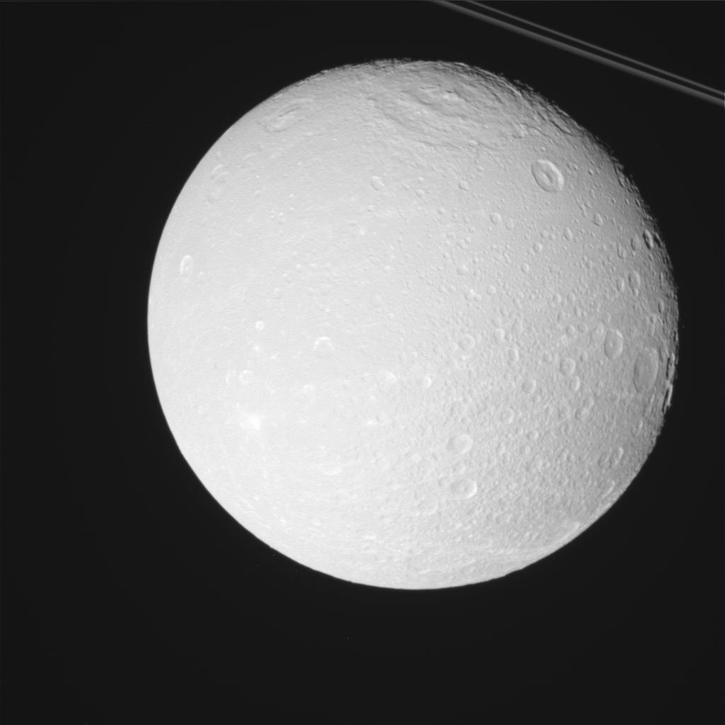 This raw, unprocessed image was taken by NASA's Cassini spacecraft on May 2, 2012. The camera was pointing toward Dione at approximately 14,835 miles (23,875 kilometers) away.