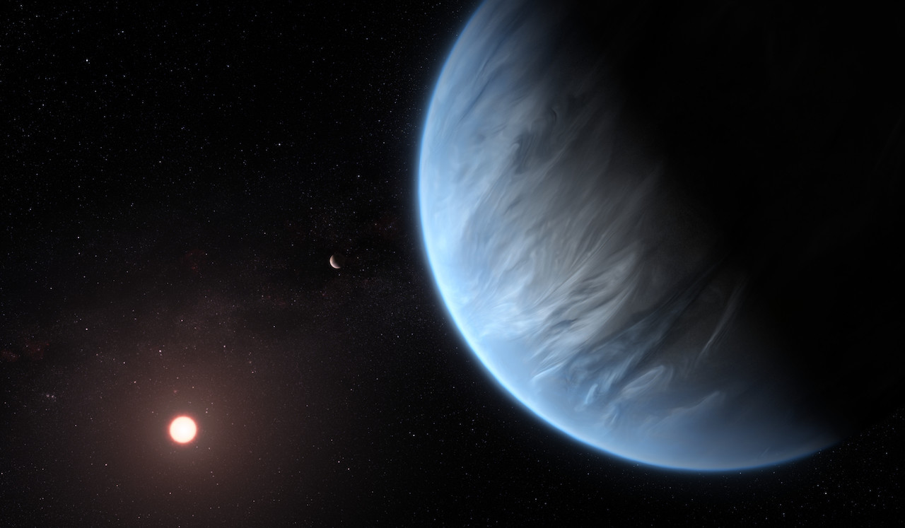 Artist's image of planet K2-18b with a companion planet and host star.