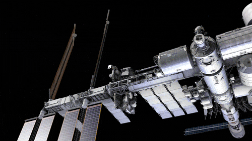 This animation starts on a wide shot of the International Space Station and zooms in to the location where the NICER payload is found. NICER is a box-shaped instrument that connects to the space station with a single arm, and it swivels in this animation, showing how it can point to different objects in the sky.