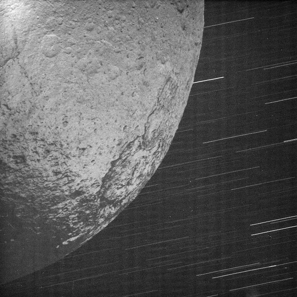 This almost surreal view of Iapetus was acquired by Cassini about 10 minutes after the spacecraft's closest approach to the icy moon during a close flyby on New Year's Eve 2004.