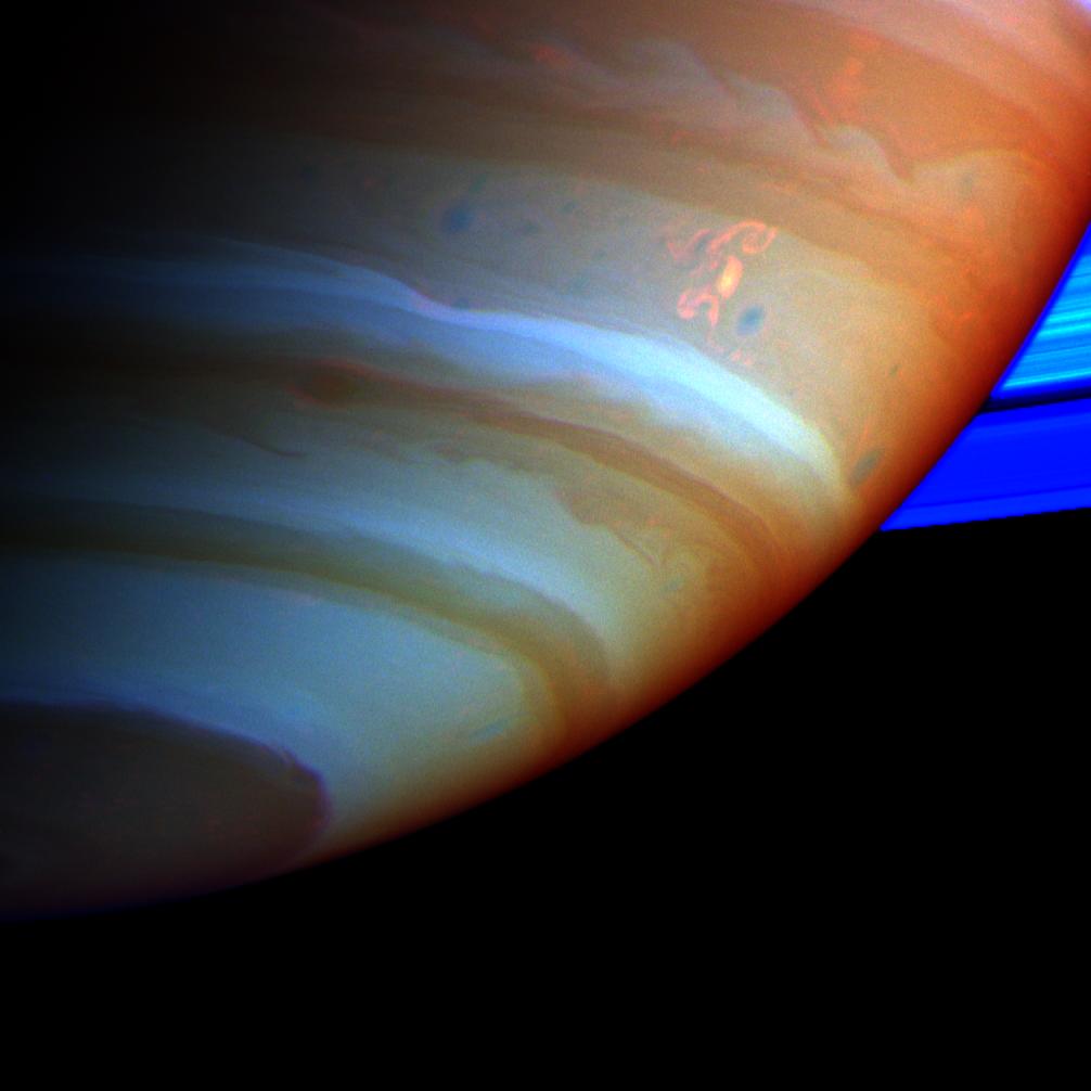 Colorful close-up of Saturn showing the 'Dragon Storm'