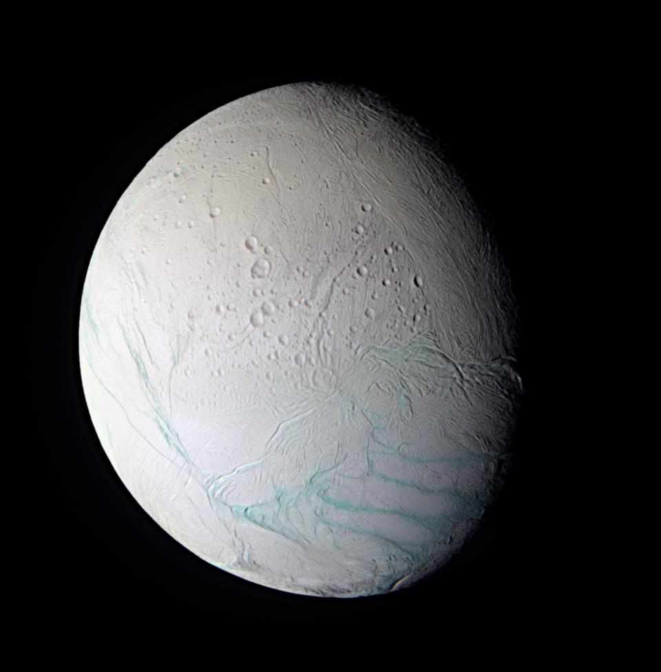 As Cassini approached the intriguing ice world of Enceladus for its extremely close flyby on July 14, 2005, the spacecraft obtained images in several wavelengths that were used to create this false-color composite view.