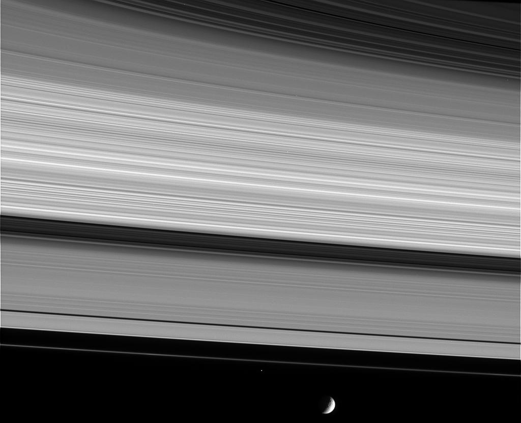Saturn's complex rings and the moon Mimas