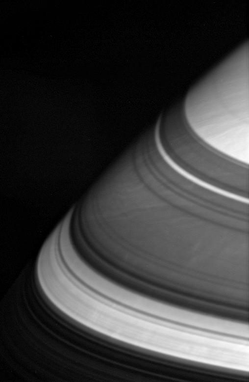 Dark shadows drape Saturn's northern latitudes