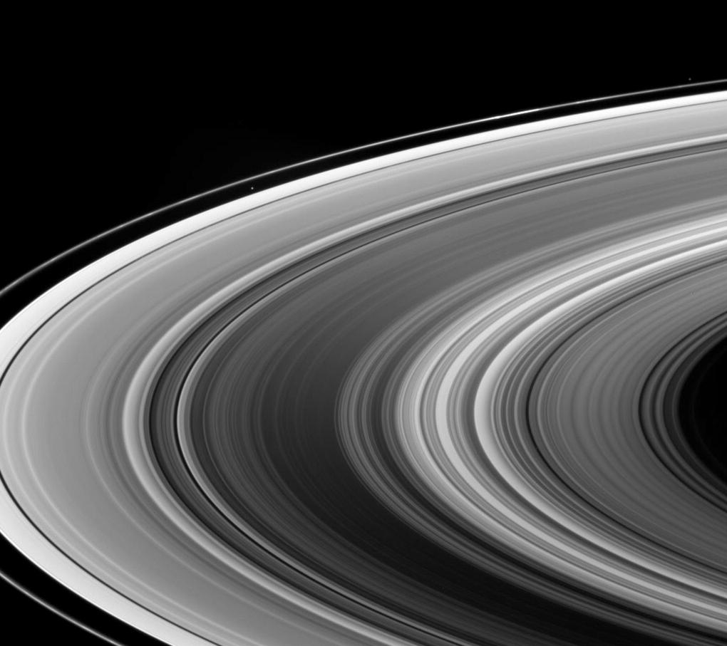This view looks down onto the unlit side of Saturn's ringplane. Atlas and Pandora are also visible.