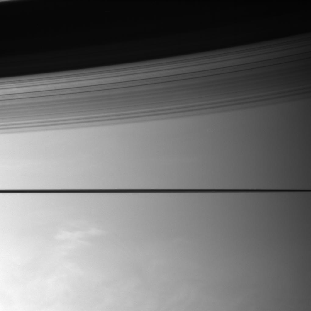 Saturn's rings cast shadows on the planet