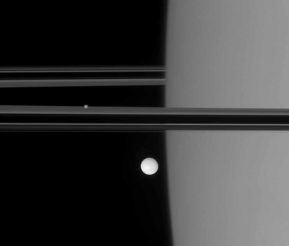 Enceladus and Epimetheus near the limb of Saturn