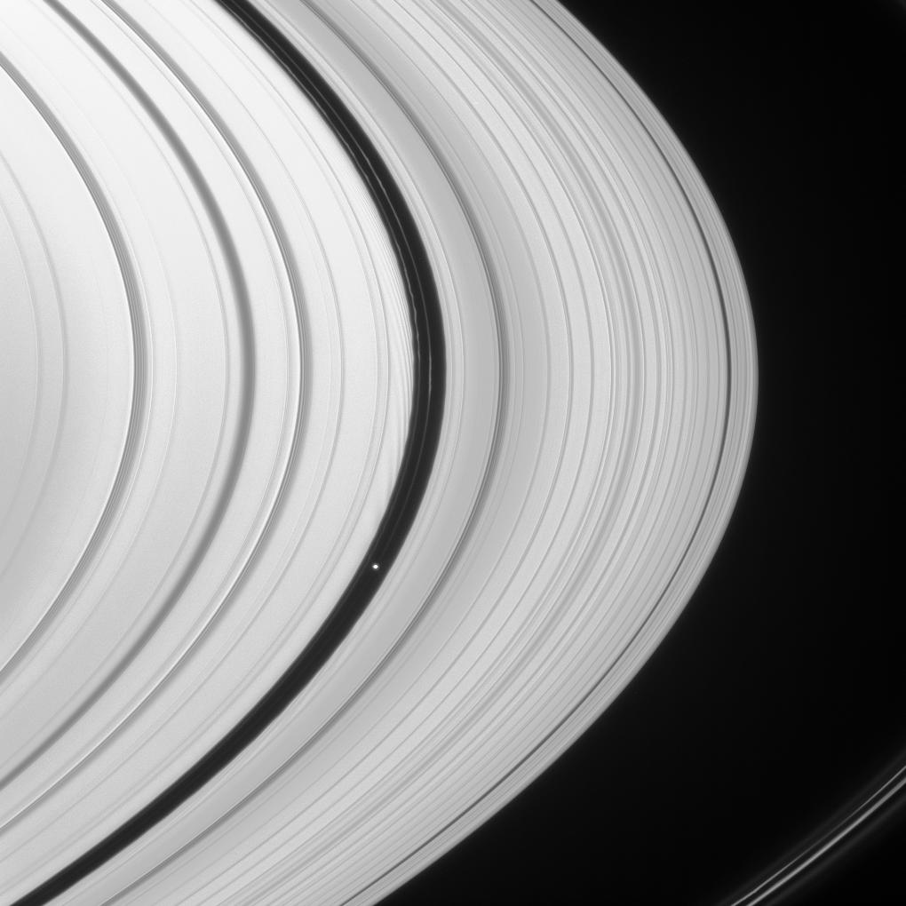 Saturn's rings and the moon Pan