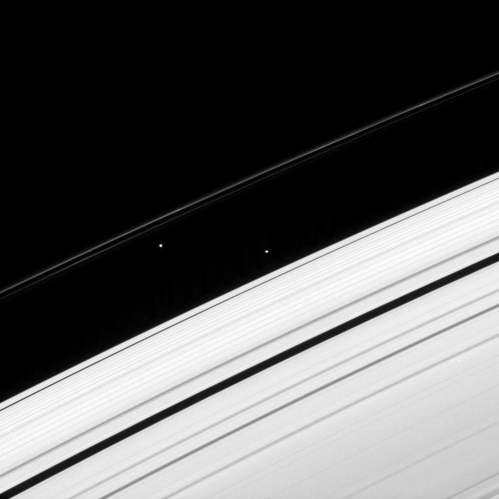 Saturn's rings,  Atlas and  Prometheus