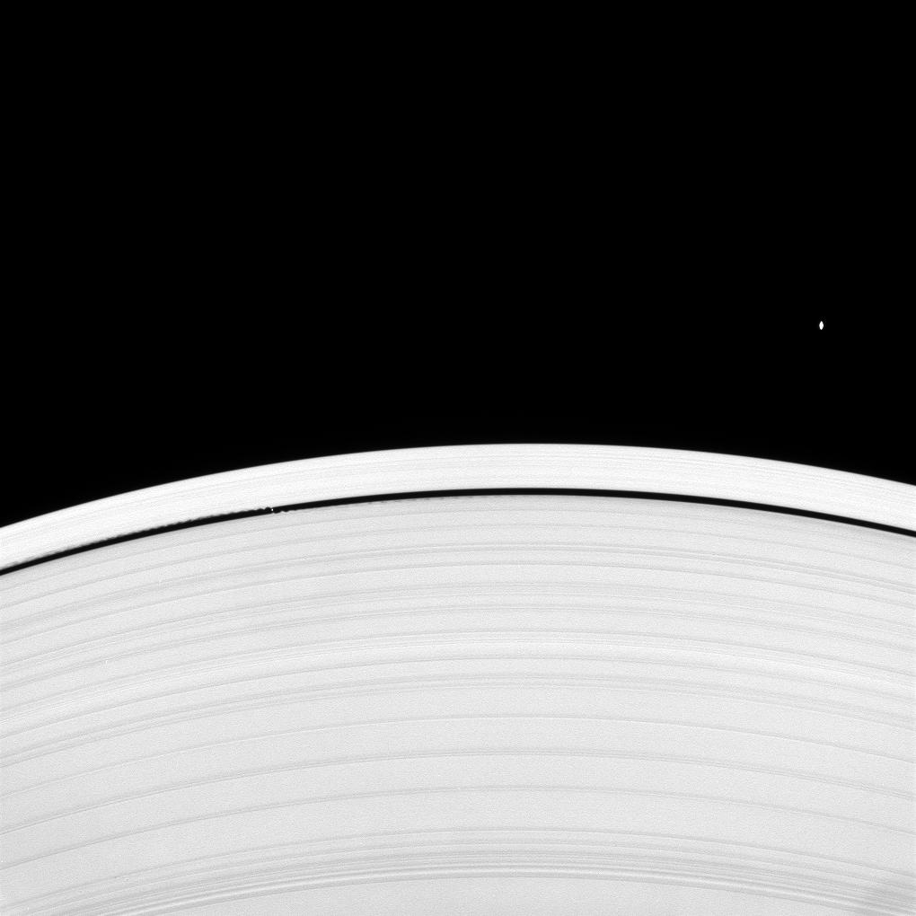 The moons Atlas and Daphnis and Saturn's rings