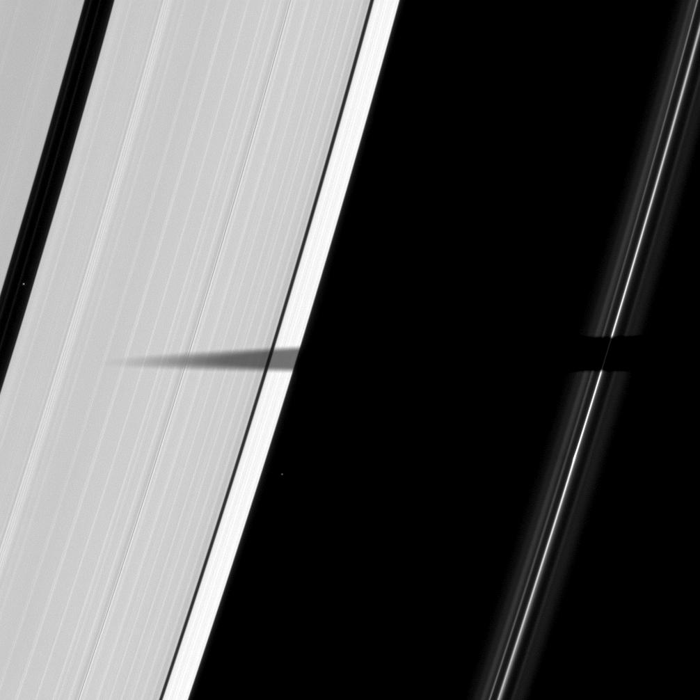 The shadow of the moon Mimas and Saturn's A and F rings