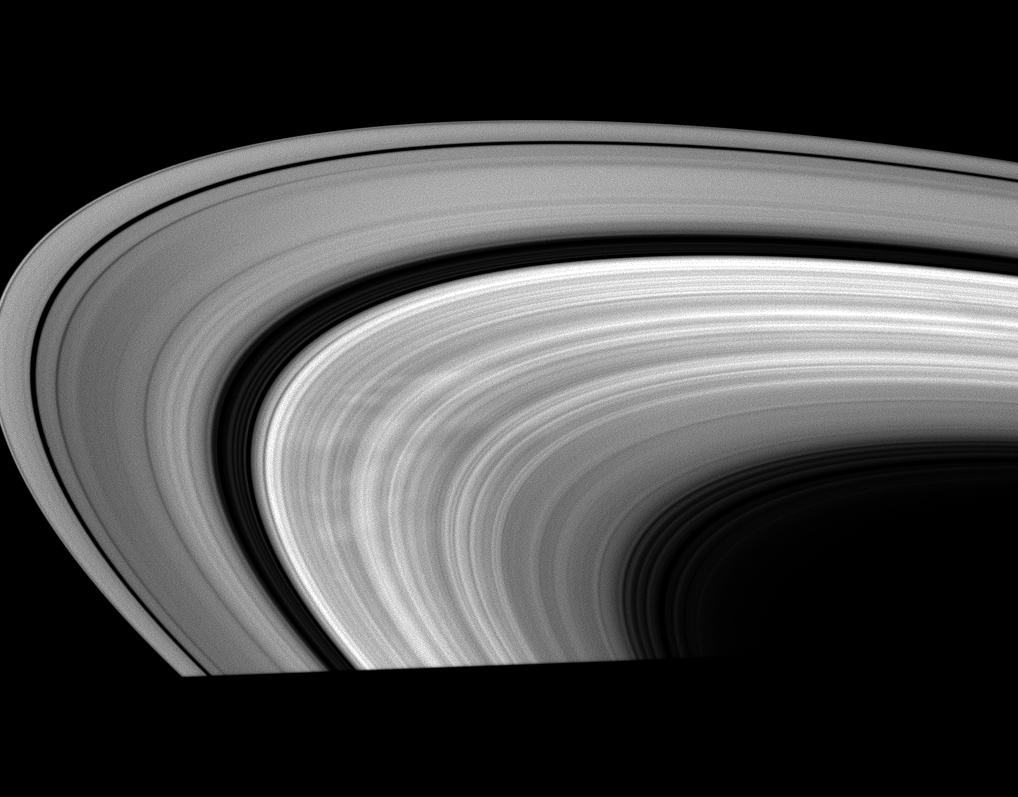 This low-phase Cassini image shows bright areas between dark spokes in Saturn's B ring.