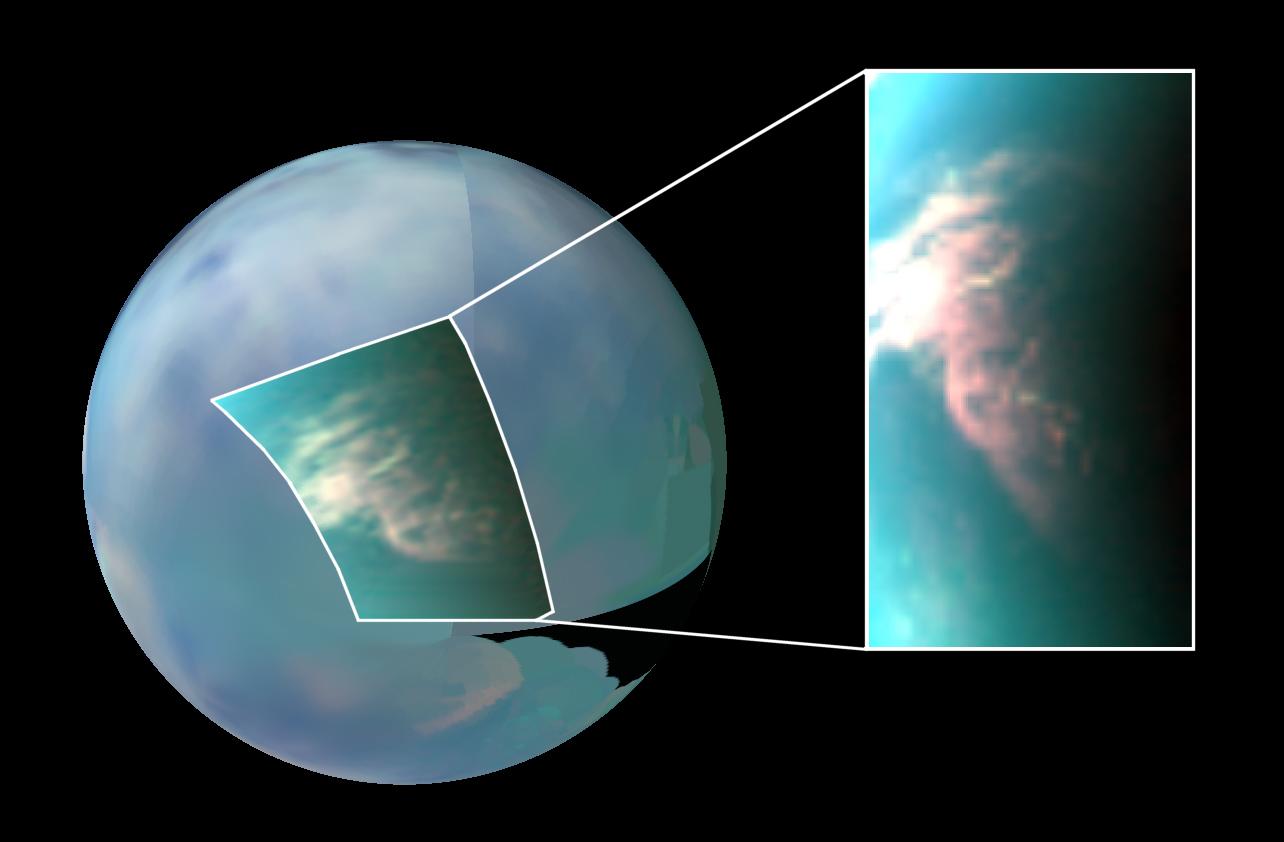 This infrared image of Saturn’s moon Titan shows a large burst of clouds in the moon’s south polar region.