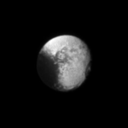 The oblate shape of the moon Iapetus is particularly noticeable in this portrait.