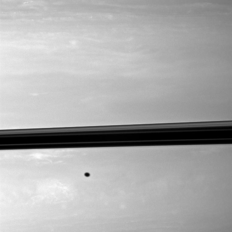a shadow from the moon Enceladus on Saturn
