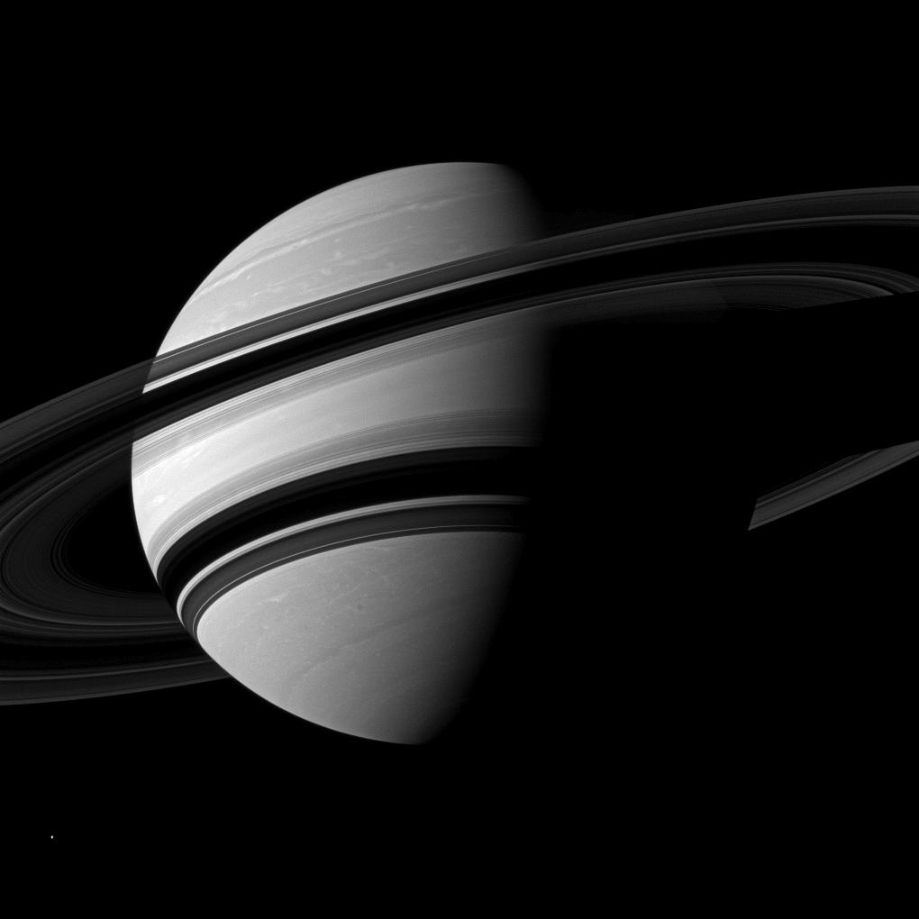Saturn and its rings on a dramatic diagonal