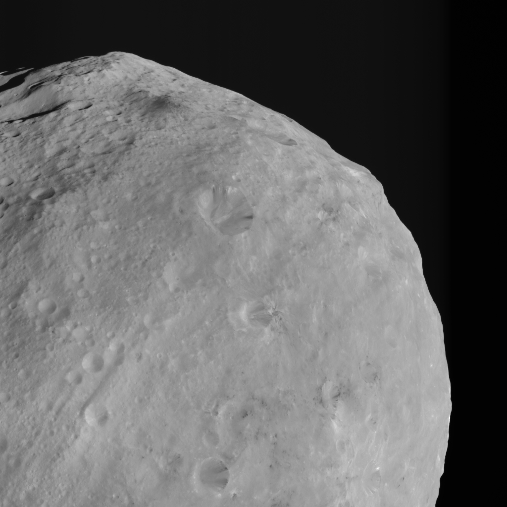 Mountains and Bright and Dark Material on Vesta