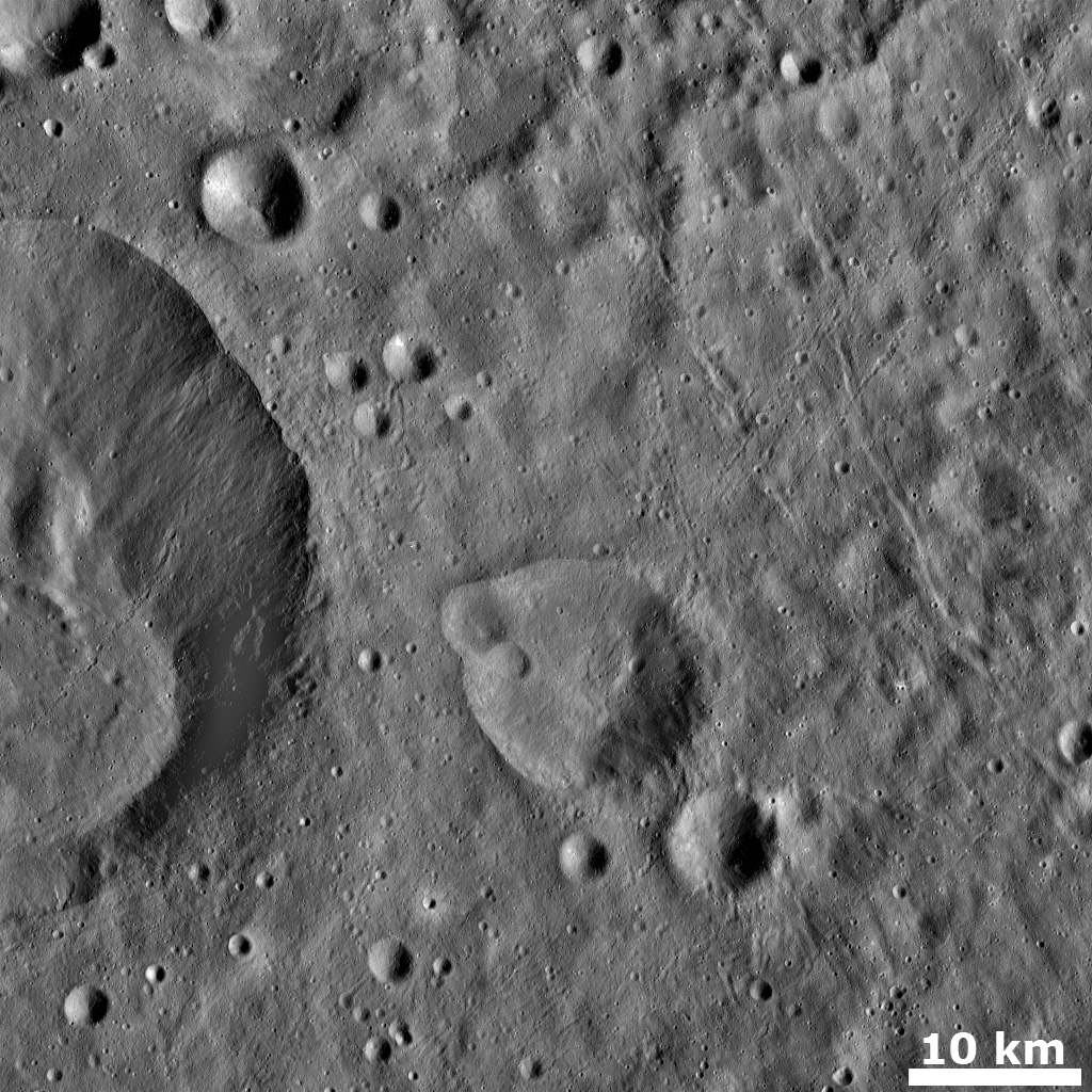 Grooves and Crater Chains on Vesta