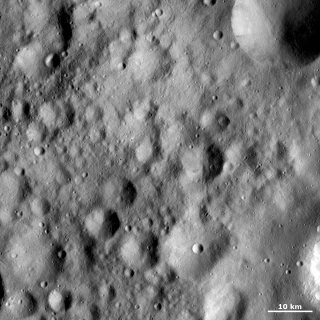 Fresh Crater Inside a Rectangular Crater - NASA Science